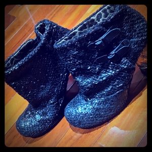 Black booties with clear heel